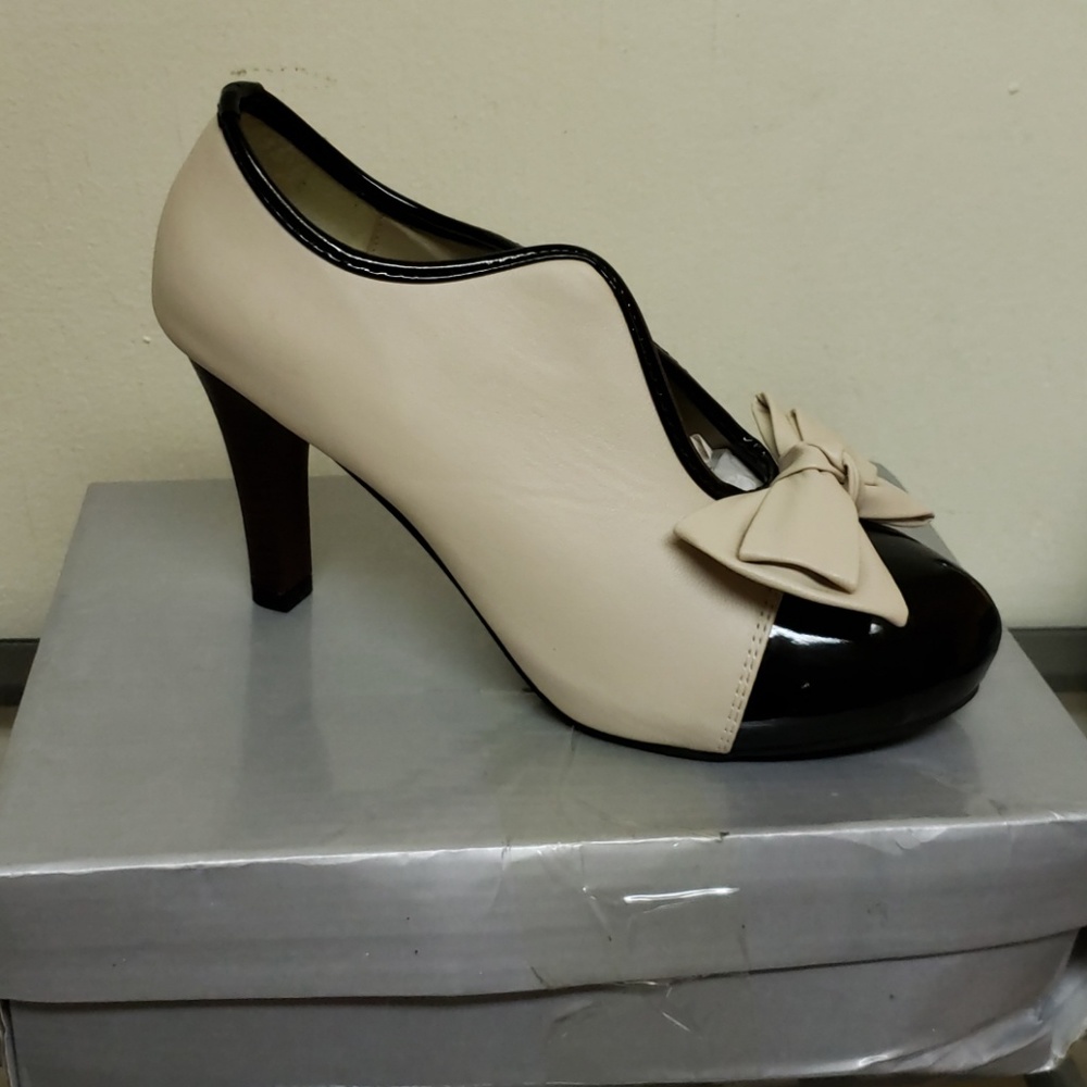 Beige and black womens bow heels